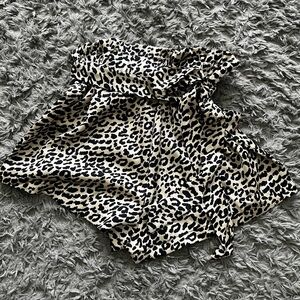 High waisted cheetah shirts. Silky material with tie belt. Never worn.